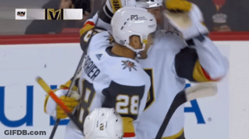 A Hockey Player With The Number 28 On Their Jersey GIF