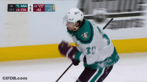 A Hockey Player With The Number 30 On His Shirt GIF