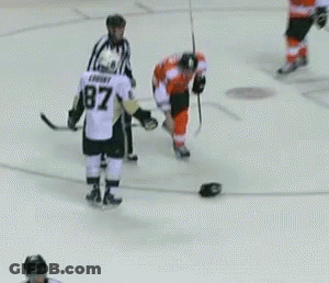 A Hockey Player With The Number 32 On His Back GIF