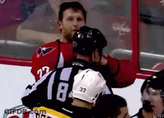 A Hockey Player With The Number 37 On Their Helmet GIF