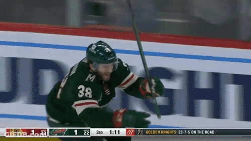 A Hockey Player With The Number 38 On His Uniform GIF