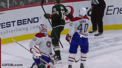 A Hockey Player With The Number 40 On Their Jersey GIF