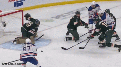 A Hockey Player With The Number 43 On His Back GIF
