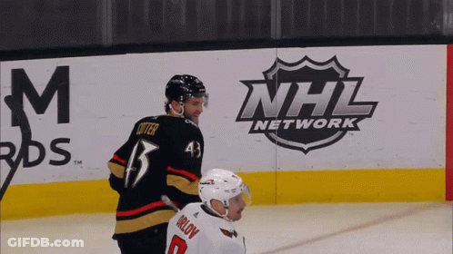 A Hockey Player With The Number 43 On His Jersey Stands In Front Of A Nhl Network Sign GIF