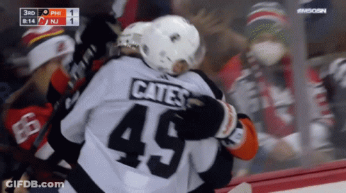 A Hockey Player With The Number 45 On Their Jersey GIF
