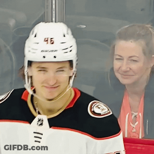A Hockey Player With The Number 46 On His Helmet Is Smiling GIF