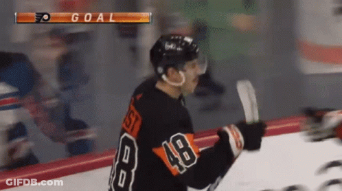 A Hockey Player With The Number 48 On His Back GIF
