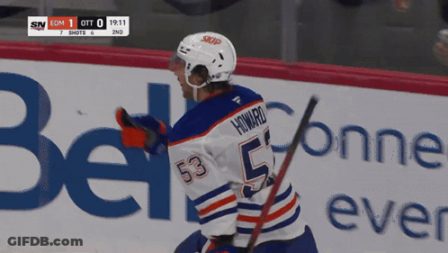A Hockey Player With The Number 53 On His Back GIF