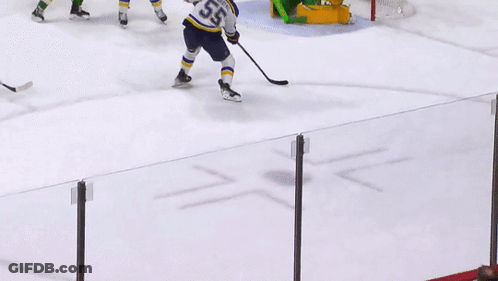A Hockey Player With The Number 55 On His Shirt GIF