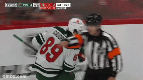 A Hockey Player With The Number 69 On His Jersey GIF