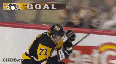 A Hockey Player With The Number 71 On His Jersey Is On The Ice GIF