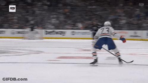 A Hockey Player With The Number 73 On His Back GIF