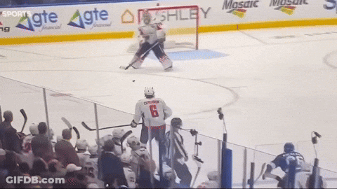 A Hockey Player With The Number 79 On The Back Of His Jersey GIF