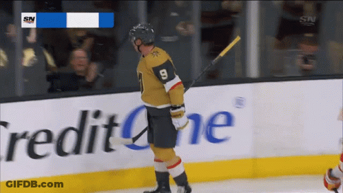 A Hockey Player With The Number 8 On His Jersey Is On The Ice GIF