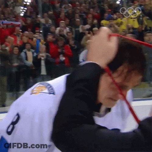 A Hockey Player With The Number 8 On The Back Of His Shirt GIF