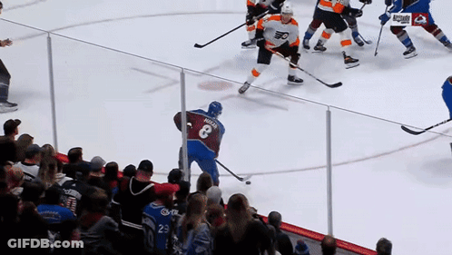 A Hockey Player With The Number 8 On Their Back GIF