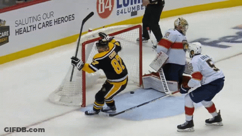 A Hockey Player With The Number 81 On His Shirt GIF