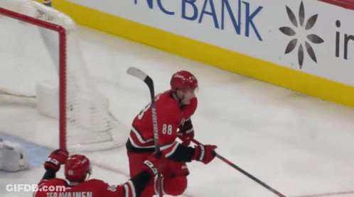 A Hockey Player With The Number 88 On His Jersey Is On The Ice GIF