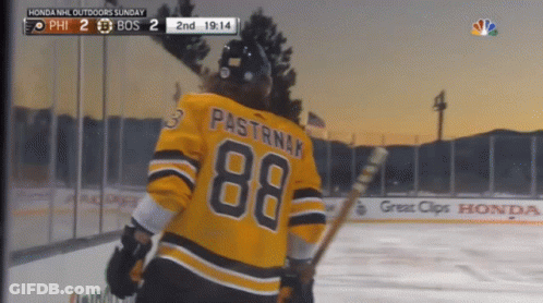 A Hockey Player With The Number 88 On His Jersey Stands On The Ice GIF