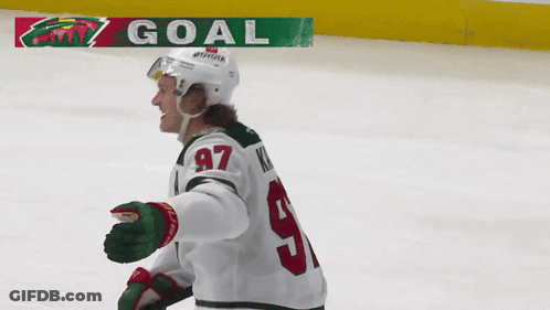 A Hockey Player With The Number 97 On His Shirt GIF