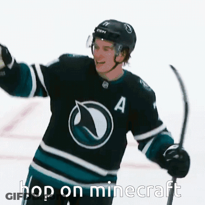A Hockey Player With The Number A On His Jersey Is Holding A Hockey Stick GIF