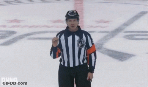 A Hockey Referee With His Arms Outstretched And The Word Rmnb In The Corner GIF