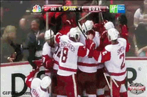 A Hockey Team Celebrates A Goal On Nbc GIF