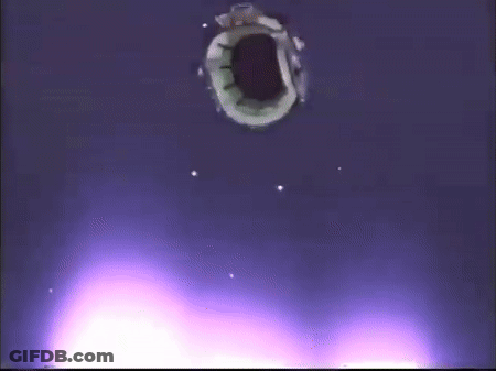 A Hole In A Wall With A Purple Light Coming Out Of It GIF