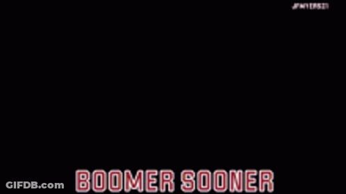 A Horse Drawn Carriage On A Football Field With The Words Boomer Sooner On The Bottom GIF