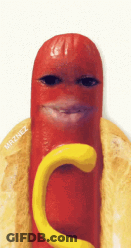 A Hot Dog On A Bun With Mustard And A Face Made Out Of It GIF