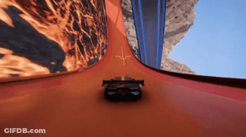 A Hot Wheels Car Is Going Down A Very Curvy Track GIF