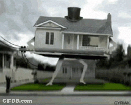 A House With A Top Hat On Top Of It Is On Stilts . GIF