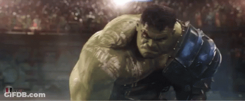 A Hulk Holding A Hammer In Front Of A Crowd With The Letters Tfdc On The Bottom GIF