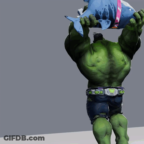 A Hulk Is Holding A Shark On His Head GIF