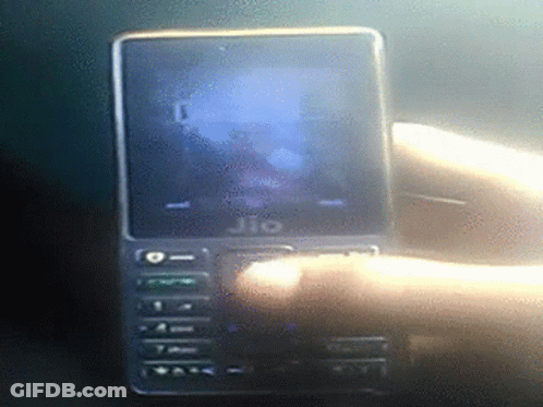 A Jio Phone Is Being Held By A Hand GIF