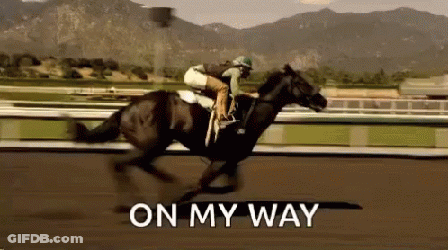 A Jockey Is Riding A Horse On A Race Track With The Words `` On My Way '' Written On The Bottom . GIF