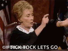 Judge At Desk In Court Giving Thumbs Up GIF