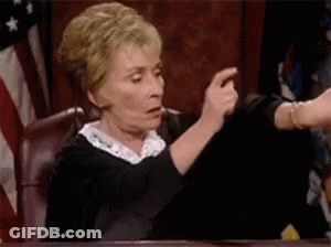 Judge Giving Thumbs Up In Front Of Flag GIF