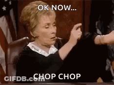 A Judge Is Sitting In A Courtroom And Giving A Thumbs Up . GIF