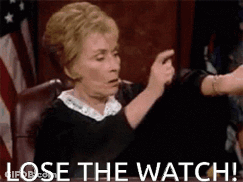 Judge Holding Paper In Courtroom GIF