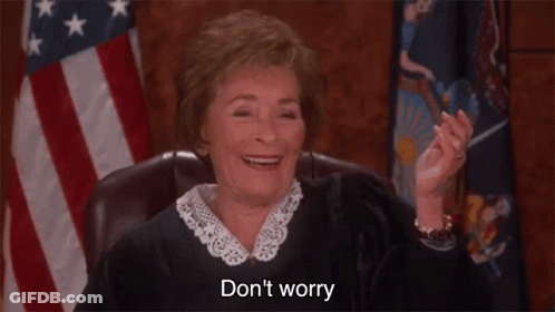 A Judge Is Smiling While Sitting In Front Of An American Flag And Saying `` Do N't Worry '' . GIF