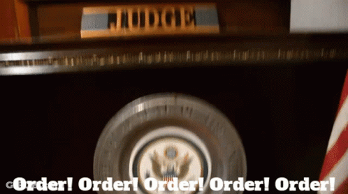 A Judge 'S Desk With The Words Order ! Order ! Order ! Order ! Order ! Order ! Order ! GIF