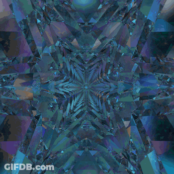 A Kaleidoscope Of Blue And Purple Geometric Shapes GIF
