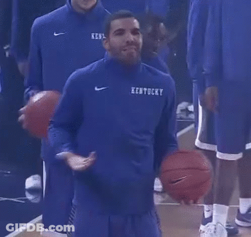 A Kentucky Basketball Player Is Standing On The Court GIF