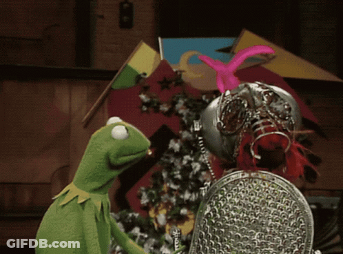 A Kermit The Frog Is Standing Next To A Knight GIF