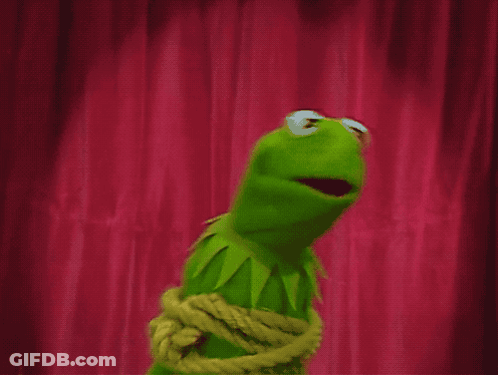 A Kermit The Frog Is Tied Up With A Rope GIF