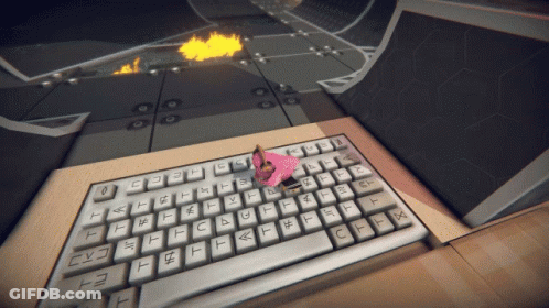 A Keyboard With A Pink Item On It That Says T On It GIF