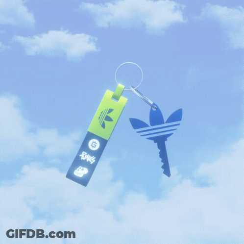 A Keychain With An Adidas Logo On It Is Floating In The Air GIF