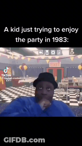 A Kid Is Trying To Enjoy A Party In 1983 . GIF