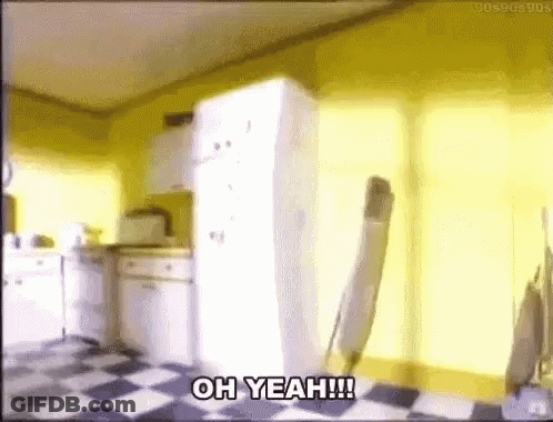 A Kitchen With A Checkered Floor And A Refrigerator That Says Oh Yeah ! GIF